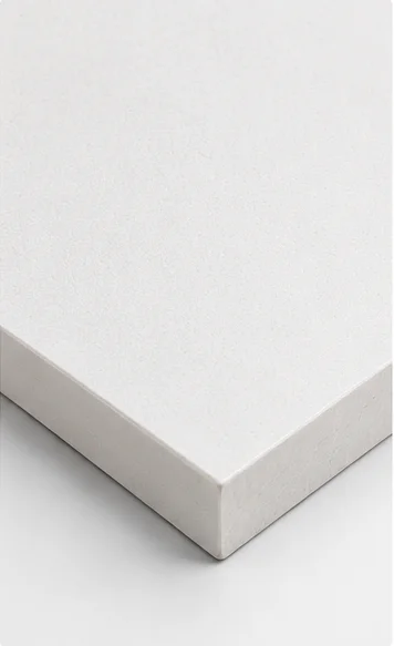 Standard smooth surface of a magnesium oxide board, providing an even finish for painting, coating, and decorative applications.