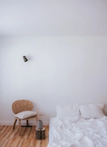 Interior wall finished with MgO board in a modern bedroom, demonstrating a clean appearance and fire-resistant building solution.