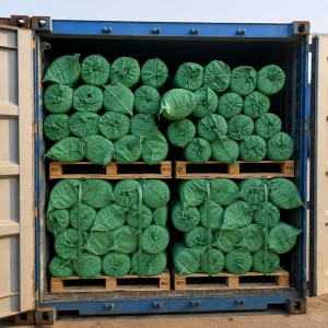Fiberglass mesh rolls packed in woven bags and loaded into a shipping container